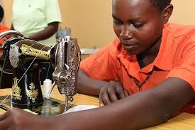 Tailoring students at work in Mungu Ninguzo Skilling Center