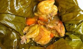 Assorted Ugandan dishes including Luwombo, Rolex, and Matoke